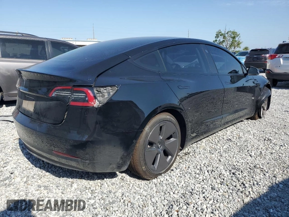 2022 Tesla Model 3 with VIN 5YJ3E1EA1NF374390, listed as a Copart auction lot 52709455 with 44,212 mi miles and Non Repairable. Bid and sale history available at carsss.com. Image 3.