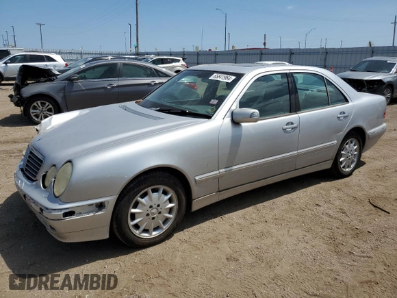 2002 Mercedes-Benz E-Class with VIN WDBJF82J92X065591, listed as a Copart auction lot 65841964 with 155,195 mi miles and Salvage Title. Bid and sale history available at carsss.com. Image 1.