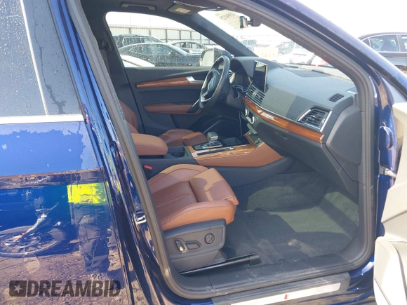 2023 Audi Q5 S line Premium Plus z VIN WA1EAAFY6P2038315, wystawiony jako IAAI lot #41990125 z przebiegiem 31 787 mil mil oraz . Historia ofert i sprzedaży dostępna na DreamBid. Obrazek 5.
