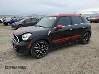 2016 MINI Countryman John Cooper Works with VIN WMWXD1C53GWS95325, listed as a Copart auction lot 77540424 with 98,951 mi miles and Salvage Title. Bid and sale history available at DreamBid. Image 1.