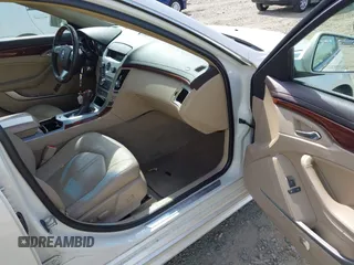 2013 Cadillac CTS Premium z VIN 1G6DS5E3XD0106332, wystawiony jako IAAI lot #42152577 z przebiegiem 114 700 mil mil oraz . Historia ofert i sprzedaży dostępna na DreamBid. Obrazek 5.