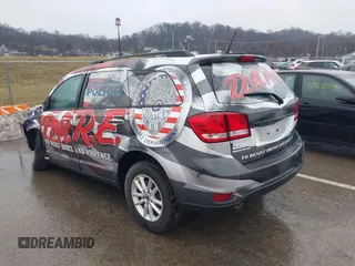 2018 Dodge Journey SXT z VIN 3C4PDCBG2JT186899, wystawiony jako IAAI lot #41465626 z przebiegiem 40 079 mil mil oraz . Historia ofert i sprzedaży dostępna na DreamBid. Obrazek 14.