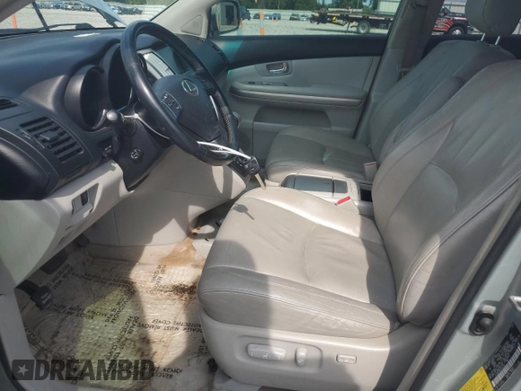 2006 Lexus RX 400h with VIN JTJHW31UX60016328, listed as a Copart auction lot 66898155 with 109,710 mi miles and Salvage title. Bid and sale history available at DreamBid. Image 7.