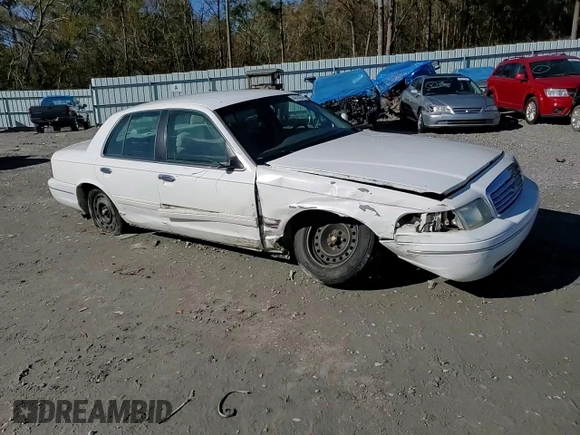 2000 Ford Crown Victoria LX z VIN 2FAFP74W0YX125595, wystawiony jako Copart lot #84675434 z przebiegiem 151 438 mil mil oraz Szkoda całkowita • Salvage title. Historia ofert i sprzedaży dostępna na DreamBid. Obrazek 11.