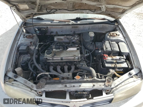 2001 Mitsubishi Mirage ES z VIN JA3AY26CX1U030593, wystawiony jako Copart lot #83749264 z przebiegiem 107 641 mil mil oraz Szkoda całkowita • Salvage title. Historia ofert i sprzedaży dostępna na DreamBid. Obrazek 11.