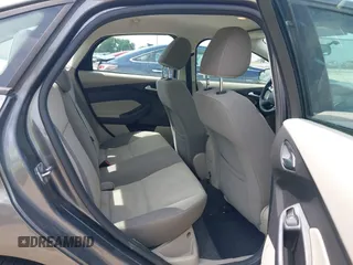 2013 Ford Focus SE z VIN 1FADP3F27DL267203, wystawiony jako IAAI lot #42470614 z przebiegiem 180 153 mil mil oraz . Historia ofert i sprzedaży dostępna na DreamBid. Obrazek 8.