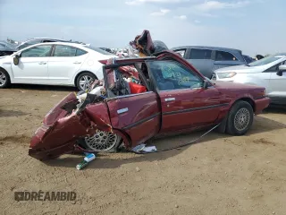 1989 Toyota Camry LE ECT z VIN JT2SV22E9K3372302, wystawiony jako Copart lot #68754144 z przebiegiem 341 387 mil mil oraz Nie do naprawy • Non repairable. Historia ofert i sprzedaży dostępna na DreamBid. Obrazek 3.