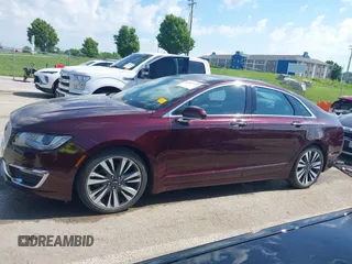 2017 Lincoln MKZ Reserve z VIN 3LN6L5F99HR648769, wystawiony jako IAAI lot #42252379 z przebiegiem 53 656 mil mil oraz . Historia ofert i sprzedaży dostępna na DreamBid. Obrazek 14.