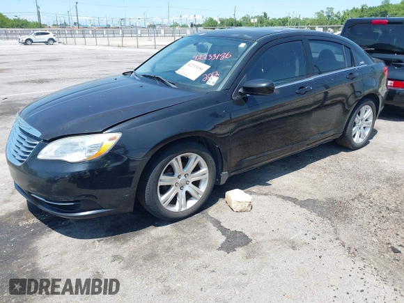 2012 Chrysler 200 Touring with VIN 1C3CCBBB8CN106867, listed as a IAAI auction lot 42233186 with 136,276 mi miles and . Bid and sale history available at DreamBid. Image 2.