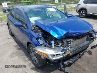 2018 Kia Forte LX with VIN 3KPFL4A77JE281839, listed as a IAAI auction lot 42012006 with 134,675 mi miles and . Bid and sale history available at DreamBid. Image 6.