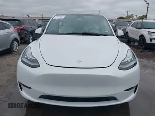 2022 Tesla Model Y Long Range z VIN 7SAYGDEE2NF420882, wystawiony jako IAAI lot #42023642 z przebiegiem 19 783 mil mil oraz . Historia ofert i sprzedaży dostępna na DreamBid. Obrazek 12.