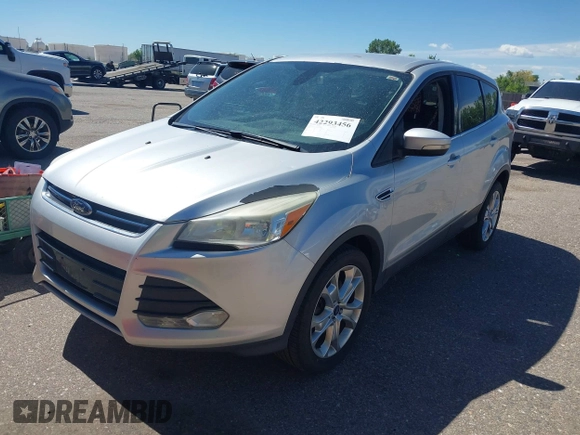 2013 Ford Escape SEL with VIN 1FMCU9HX0DUD42081, listed as a IAAI auction lot 42293456 with 100,013 mi miles and . Bid and sale history available at DreamBid. Image 2.