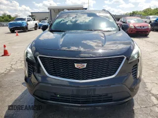 2020 Cadillac XT4 FWD Sport with VIN 1GYFZER48LF012489, listed as a Copart auction lot 54434025 with 74,249 mi miles and Salvage title. Bid and sale history available at DreamBid. Image 5.