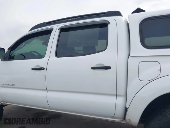 2009 Toyota Tacoma PreRunner with VIN 3TMJU62N49M076433, listed as a IAAI auction lot 41902369 with 164,827 mi miles. Bid and sale history available at carsss.com. Image 14.