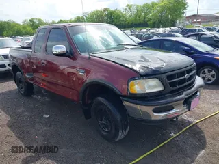 1997 Ford F-150 z VIN 1FTDX0868VKA19221, wystawiony jako IAAI lot #42094451 z przebiegiem 184 742 mil mil oraz . Historia ofert i sprzedaży dostępna na DreamBid. Obrazek 1.
