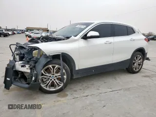 2022 BMW X2 xDrive28i with VIN WBXYJ1C02N5U07106, listed as a Copart auction lot 48243575 with 65,140 mi miles and Clean Title. Bid and sale history available at carsss.com. Image 1.