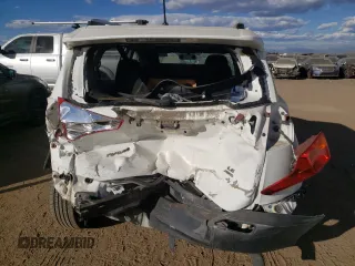 2014 Toyota RAV4 LE with VIN JTMBFREV0EJ009007, listed as a Copart auction lot 77417724 with 128,543 mi miles and Salvage Title. Bid and sale history available at DreamBid. Image 6.