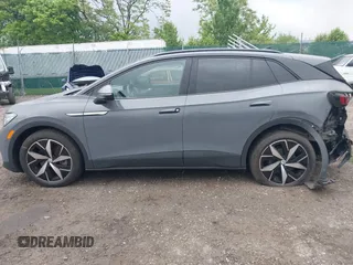 2023 Volkswagen ID.4 S z VIN 1V25MPE82PC026625, wystawiony jako IAAI lot #42256114 z przebiegiem 37 084 mil mil oraz . Historia ofert i sprzedaży dostępna na DreamBid. Obrazek 14.