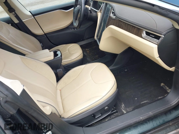 2013 Tesla Model S с VIN 5YJSA1CN1DFP27013, выставлен на аукционе IAAI как лот 42014212 с пробегом 65 858 миль миль и . История ставок и продаж доступна на DreamBid. Изображение 5.
