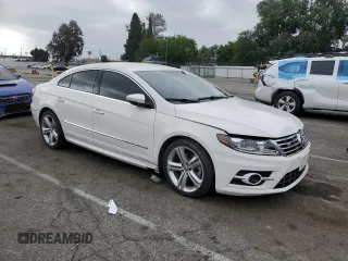 2015 Volkswagen CC Sport с VIN WVWBP7AN7FE804704, выставлен на аукционе Copart как лот 56415865 с пробегом 42 765 миль миль и Списание • Salvage title. История ставок и продаж доступна на DreamBid. Изображение 4.