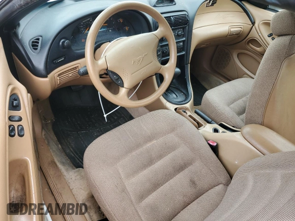 1997 Ford Mustang with VIN 1FALP4046VF180467, listed as a Copart auction lot 60754265 with 154,676 mi miles and Salvage title. Bid and sale history available at DreamBid. Image 8.