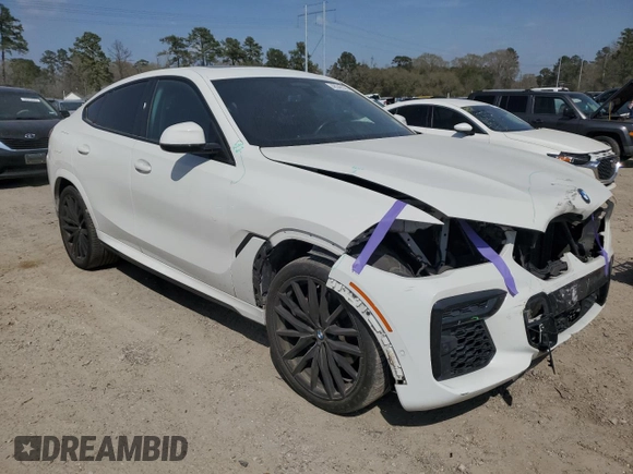 2022 BMW X6 xDrive40i z VIN 5UXCY6C0XN9K78927, wystawiony jako Copart lot #48348335 z przebiegiem 63 074 mil mil oraz Szkoda całkowita • Salvage title. Historia ofert i sprzedaży dostępna na DreamBid. Obrazek 4.