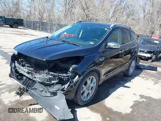 2014 Ford Escape Titanium with VIN 1FMCU0JX1EUE12260, listed as a IAAI auction lot 41826246 with 178,532 mi miles. Bid and sale history available at carsss.com. Image 2.