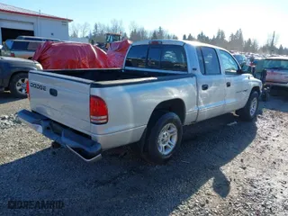 2001 Dodge Dakota Sport with VIN 1B7GL2AN21S158812, listed as a IAAI auction lot 41483542 with 175,135 mi miles. Bid and sale history available at carsss.com. Image 4.