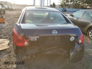 2005 Nissan Maxima 3.5 SE with VIN 1N4BA41E35C853740, listed as a Copart auction lot 41699305 with 104,756 mi miles and Salvage Title. Bid and sale history available at carsss.com. Image 6.