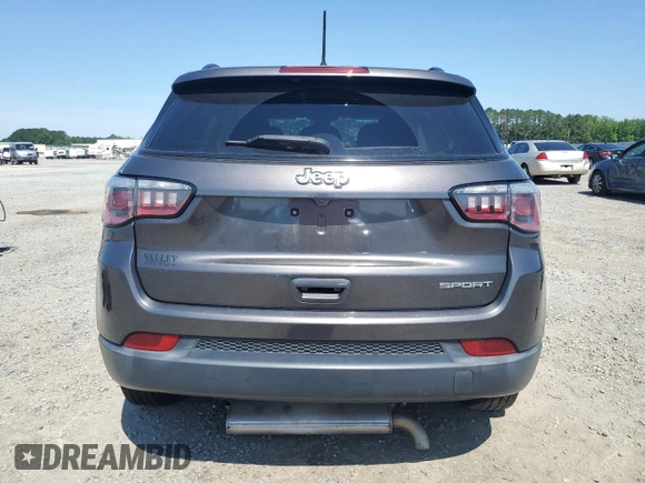 2018 Jeep Compass Sport with VIN 3C4NJCABXJT105430, listed as a Copart auction lot 59237575 with 104,600 mi miles and Salvage title. Bid and sale history available at DreamBid. Image 6.