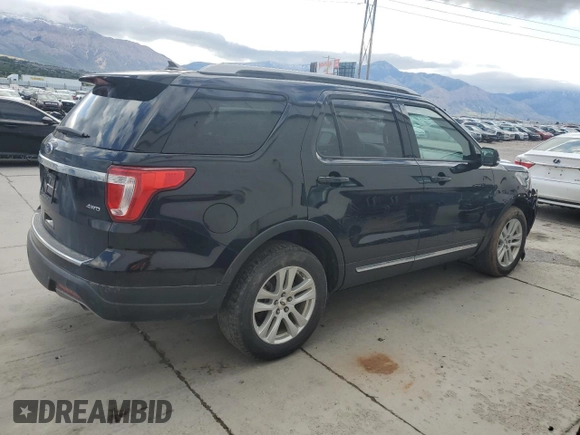 2018 Ford Explorer XLT with VIN 1FM5K8D84JGB94843, listed as a Copart auction lot 55755645 with 104,709 mi miles and Salvage title. Bid and sale history available at DreamBid. Image 3.