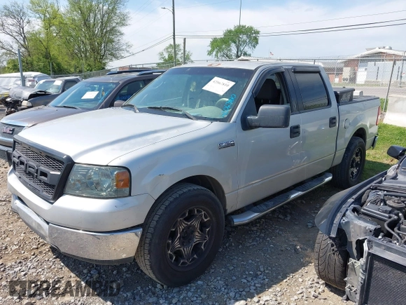 2005 Ford F-150 XLT with VIN 1FTPW12505KD72168, listed as a IAAI auction lot 42063810 with 232,964 mi miles. Bid and sale history available at carsss.com. Image 2.