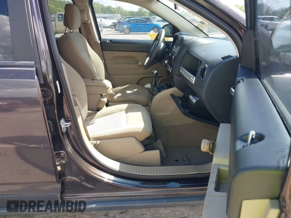 2014 Jeep Compass Sport with VIN 1C4NJCBA4ED626998, listed as a IAAI auction lot 42179793 with 109,059 mi miles. Bid and sale history available at carsss.com. Image 5.
