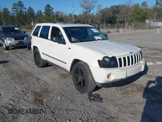 2007 Jeep Grand Cherokee with VIN 1J8HS48N57C552678, listed as a IAAI auction lot 41593257 with 228,199 mi miles and . Bid and sale history available at DreamBid. Image 1.