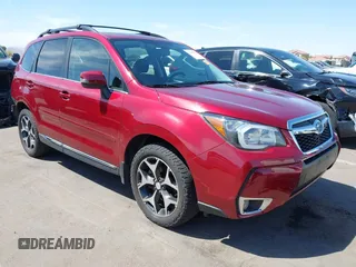 2015 Subaru Forester 2.0XT Touring with VIN JF2SJGWC9FH579887, listed as a IAAI auction lot 41999214 with 147,882 mi miles. Bid and sale history available at carsss.com. Image 1.