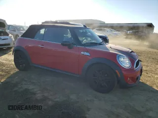 2014 MINI Convertible S with VIN WMWZP3C54ET298129, listed as a Copart auction lot 88523065 with 54,788 mi miles and Salvage title. Bid and sale history available at DreamBid. Image 4.