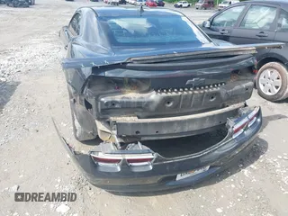 2013 Chevrolet Camaro LS z VIN 2G1FA1E39D9206888, wystawiony jako IAAI lot #42170703 z przebiegiem 169 661 mil mil oraz . Historia ofert i sprzedaży dostępna na DreamBid. Obrazek 6.