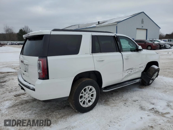 2020 GMC Yukon SLT with VIN 1GKS2BKC1LR280389, listed as a Copart auction lot 87928555 with 84,242 mi miles and Salvage Title. Bid and sale history available at carsss.com. Image 3.