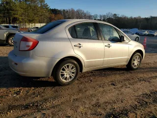 2012 Suzuki SX4 LE with VIN JS2YC5A38C6300439, listed as a Copart auction lot 85121124 with 74,324 mi miles and Clean Title. Bid and sale history available at carsss.com. Image 3.