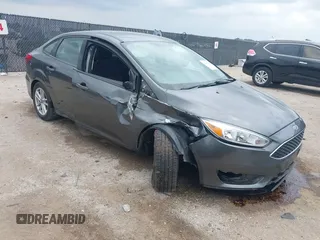 2018 Ford Focus SE with VIN 1FADP3F23JL321768, listed as a IAAI auction lot 42415788 with 124,126 mi miles and . Bid and sale history available at DreamBid. Image 1.