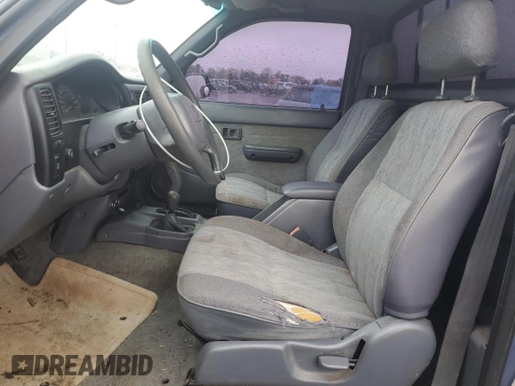 1999 Toyota Tacoma with VIN 4TAPM62N3XZ485783, listed as a Copart auction lot 52459485 with 294,237 mi miles and Clean Title. Bid and sale history available at DreamBid. Image 7.