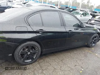 2015 BMW 3 Series 328i with VIN WBA3A5C59FF606236, listed as a IAAI auction lot 41690502 with 115,085 mi miles. Bid and sale history available at carsss.com. Image 13.