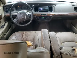 1999 Mercury Grand Marquis LS с VIN 2MEFM75W9XX701991, выставлен на аукционе Copart как лот 58388085 с пробегом 163 160 миль миль и Списание • Salvage title. История ставок и продаж доступна на DreamBid. Изображение 8.