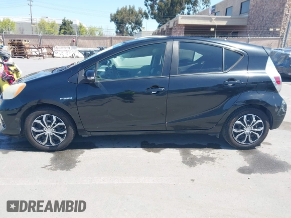 2012 Toyota Prius c One with VIN JTDKDTB36C1527223, listed as a IAAI auction lot 42002927 with 138,176 mi miles. Bid and sale history available at carsss.com. Image 14.