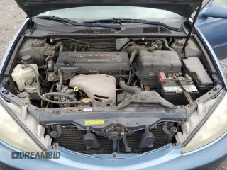 2004 Toyota Camry LE z VIN 4T1BE30K94U892207, wystawiony jako Copart lot #58406245 z przebiegiem 318 751 mil mil oraz Czysty tytuł • Clean title. Historia ofert i sprzedaży dostępna na DreamBid. Obrazek 11.