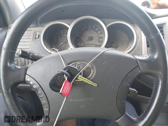 2009 Toyota Tacoma with VIN 3TMLU42N19M034332, listed as a IAAI auction lot 42157119 with 195,272 mi miles and . Bid and sale history available at DreamBid. Image 11.