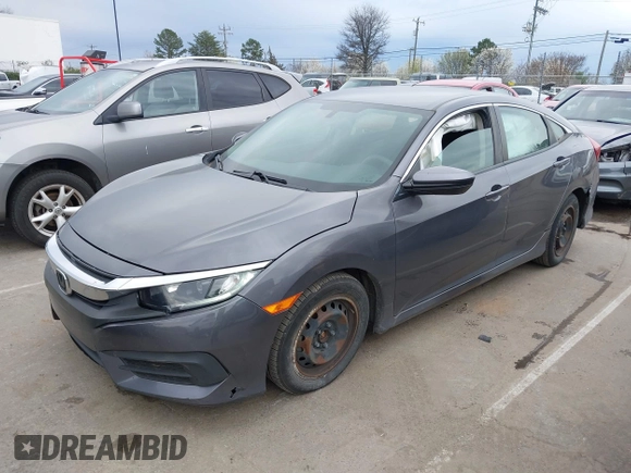 2017 Honda Civic LX with VIN 19XFC2F52HE233607, listed as a IAAI auction lot 41758632 with 159,290 mi miles and . Bid and sale history available at DreamBid. Image 21.