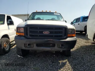 1999 Ford F-350 with VIN 1FDSF35L6XEA33184, listed as a Copart auction lot 69857024 with 100,545 mi miles and Salvage title. Bid and sale history available at DreamBid. Image 5.