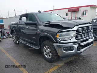 2022 Ram 2500 Laramie with VIN 3C6UR5FL2NG243857, listed as a IAAI auction lot 41736144 with 58,474 mi miles. Bid and sale history available at carsss.com. Image 1.