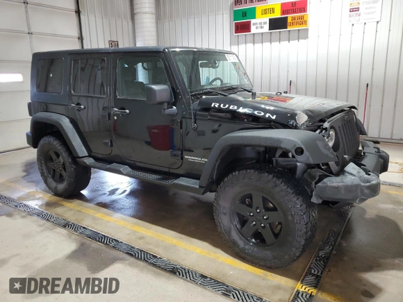 2009 Jeep Wrangler Unlimited Rubicon with VIN 1J8GA69179L756441, listed as a Copart auction lot 52111435 with 157,818 mi miles and Salvage title. Bid and sale history available at DreamBid. Image 4.
